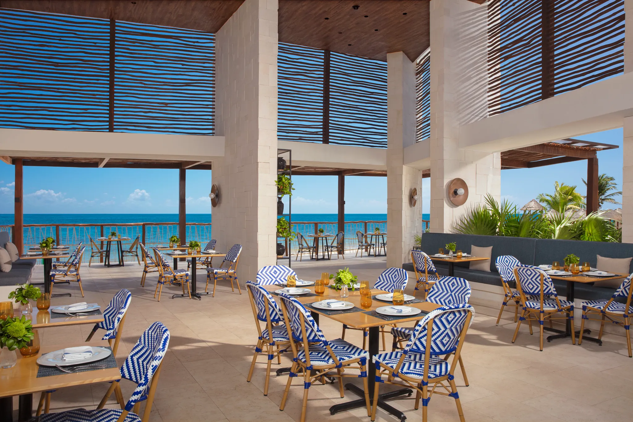 Bluewater Grill at Dreams Sapphire Resort & Spa featuring an upscale steakhouse atmosphere, premium cuts of meat, and elegant indoor dining.