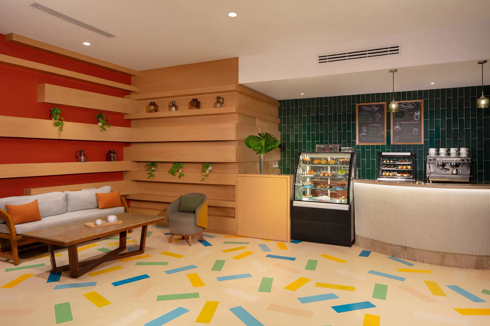 Coco Café at Dreams Sapphire Resort & Spa featuring a cozy coffee shop atmosphere, specialty beverages, fresh pastries, and gourmet snacks.