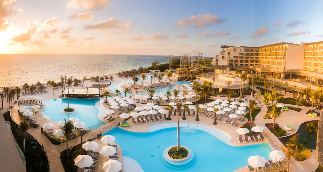 Dreams Natura Resort & Spa featuring unique eco-park setting with cenotes, lazy river, and nature-immersive grounds near Cancun, Mexico.