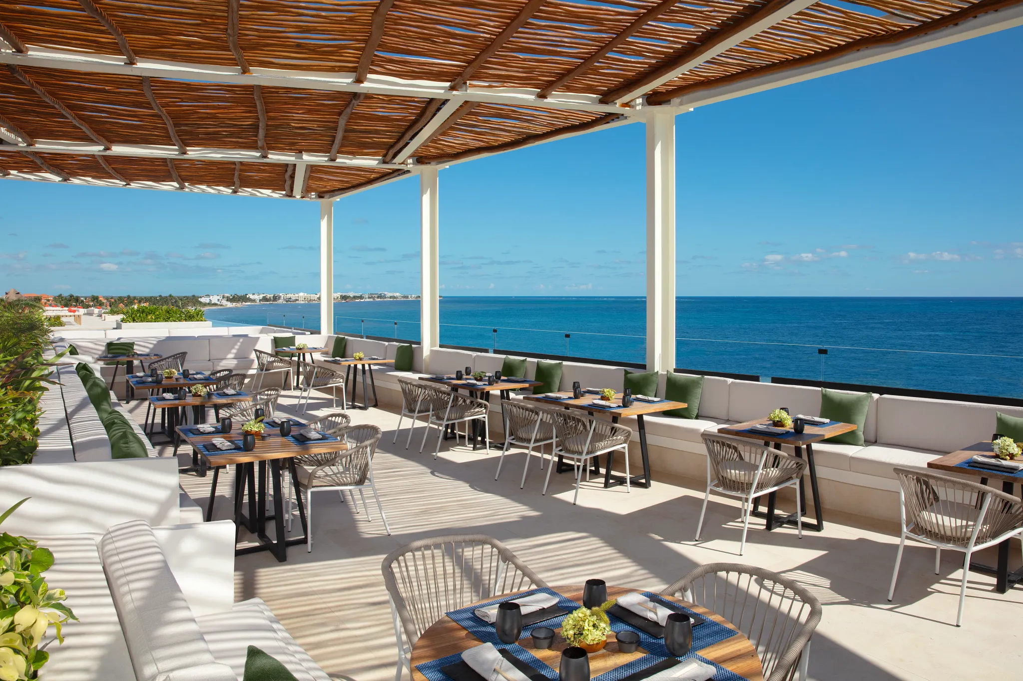 Gohan at Dreams Sapphire Resort & Spa featuring a contemporary sushi bar, fresh Japanese specialties, and an elegant dining atmosphere.