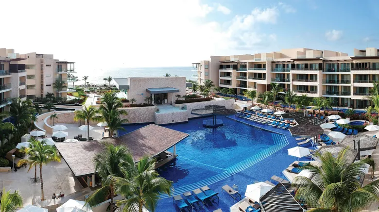 Hideaway at Royalton Riviera Cancun adults-only all-inclusive resort with beachfront pools and upscale accommodations.