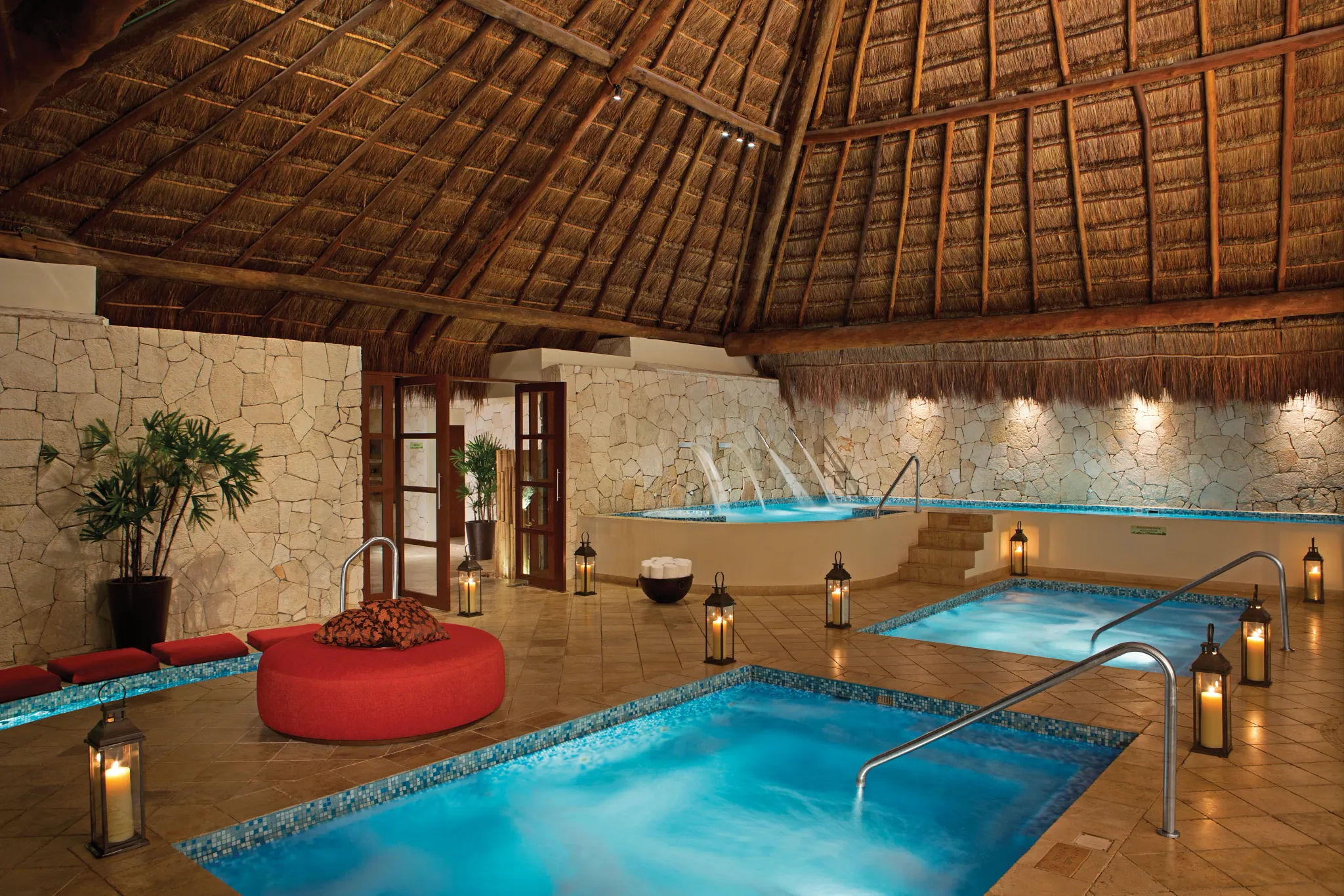 Hydrotherapy circuit and relaxation pools inside the spa at Dreams Sapphire Resort & Spa.