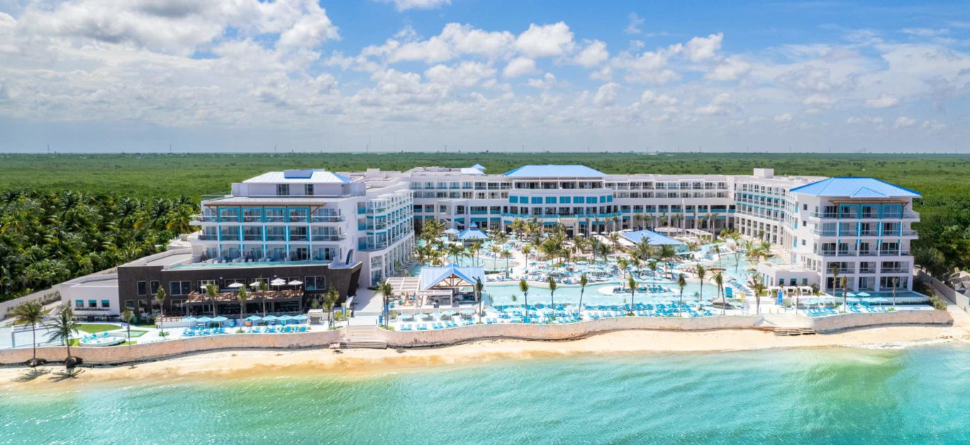 Margaritaville Island Reserve Riviera Cancun all-inclusive beachfront resort with tropical pools and island-inspired atmosphere.