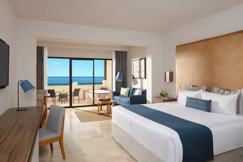 Preferred Club Junior Suite Ocean Front with king bed and oceanfront terrace at Dreams Sapphire Resort & Spa.