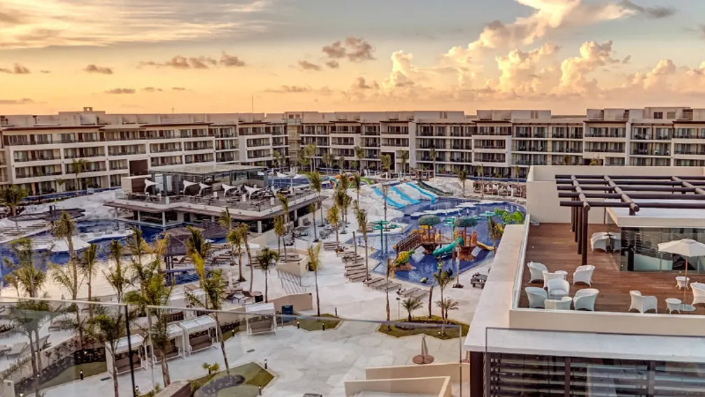 Royalton Riviera Cancun all-inclusive resort with expansive pools, beachfront views, and modern architecture on the Riviera Maya.