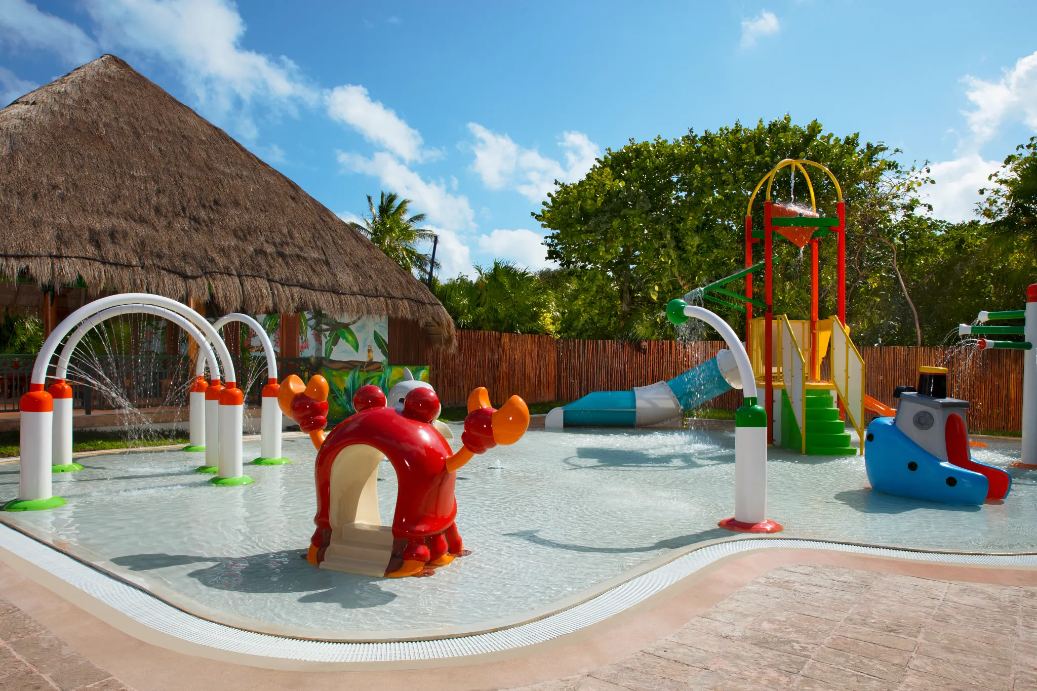Children’s splash park with water features and play structures at Dreams Sapphire Resort & Spa in Riviera Cancun.